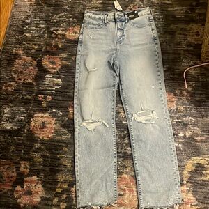 Women's Light Blue Distressed Jeans